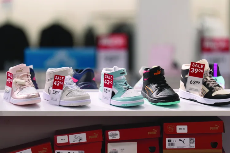 Families feel the pinch of higher children's shoe prices as kids head back to school